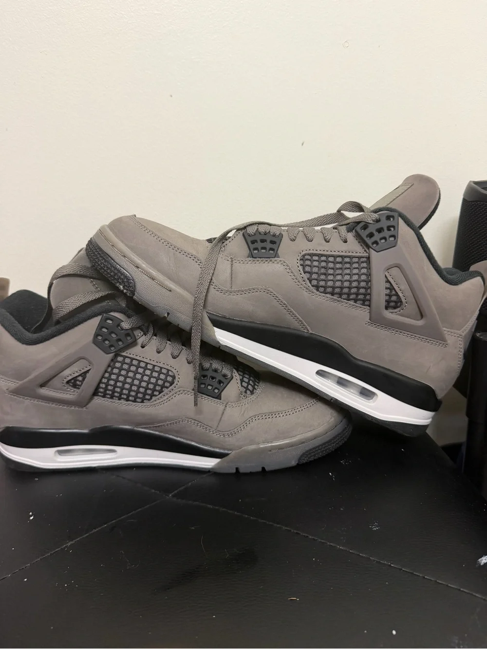 Jordan Retro 4 Sneakers in Grey and Black